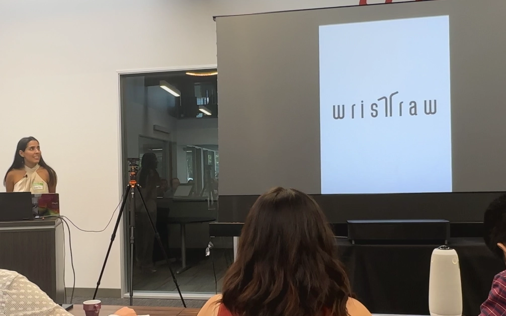 wristraw founders pitching the brand's design direction to a small group