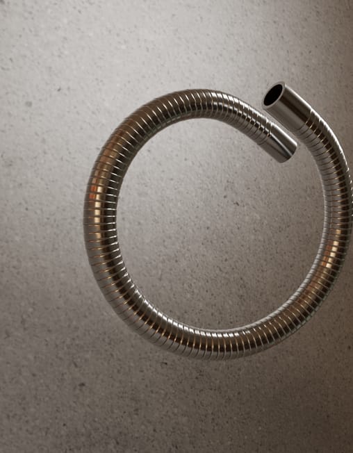 wristraw coiled shut around the wrist, still clasped