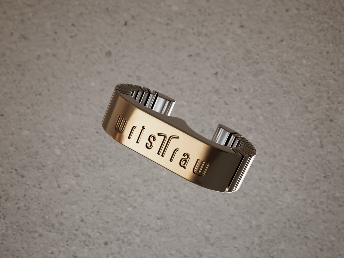 Second angle of the wristraw titanium clasp, open, showing the engraved wordmark across the top face