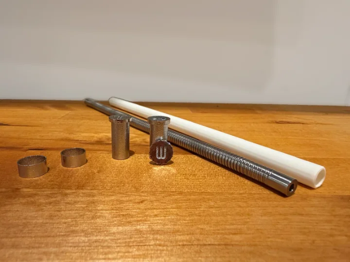 CNC titanium clasp and steel-printed parts